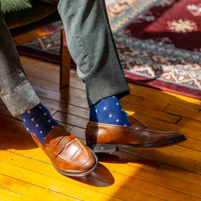 The Sailmakers - A Cobalt Blue Sock with White Sail Motifs
