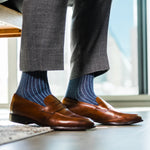 A Prussian Blue men's dress sock with an Arctic Blue Ribbed Pattern