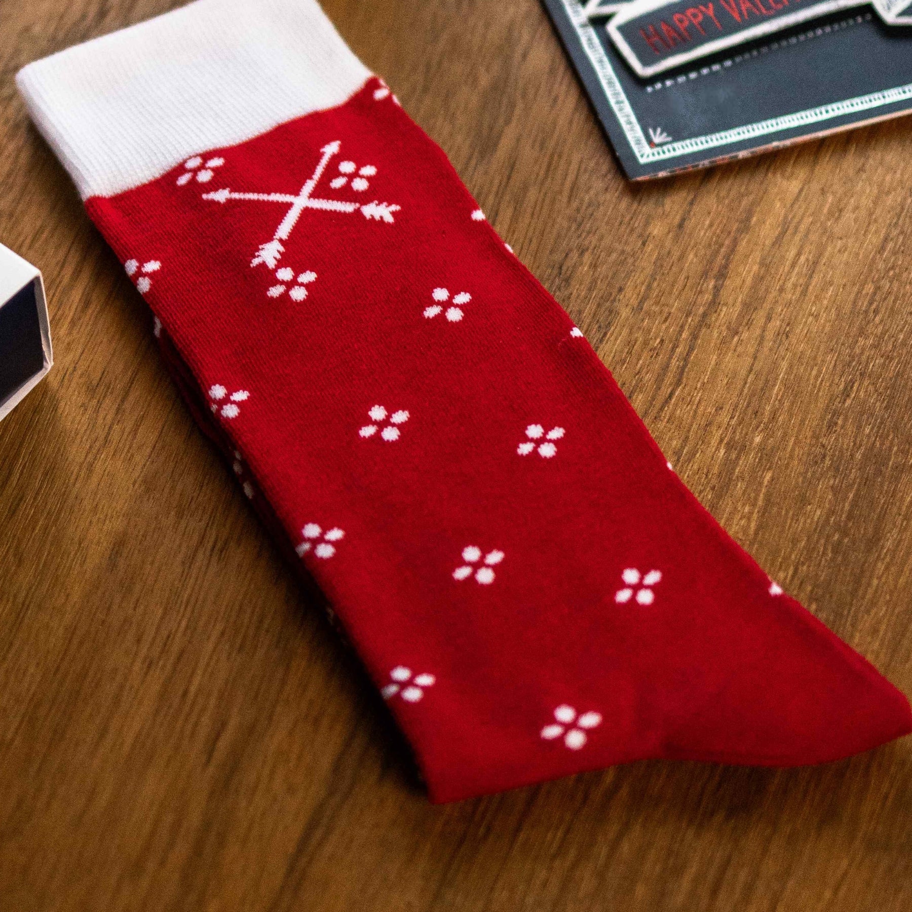 Cherry Red men's dress sock with a white flower pattern