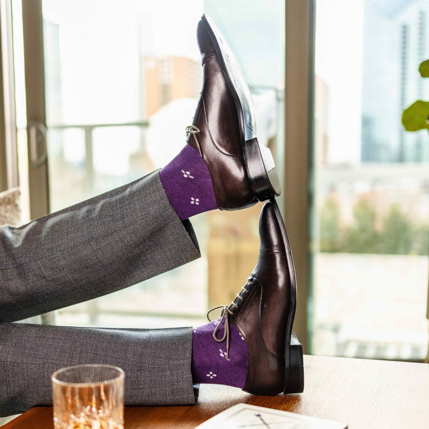 Purple men's dress sock with a white flower pattern