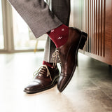 Cranberry Red men's dress sock with a white flower pattern