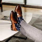 navy blue socks with a white zigzag pattern