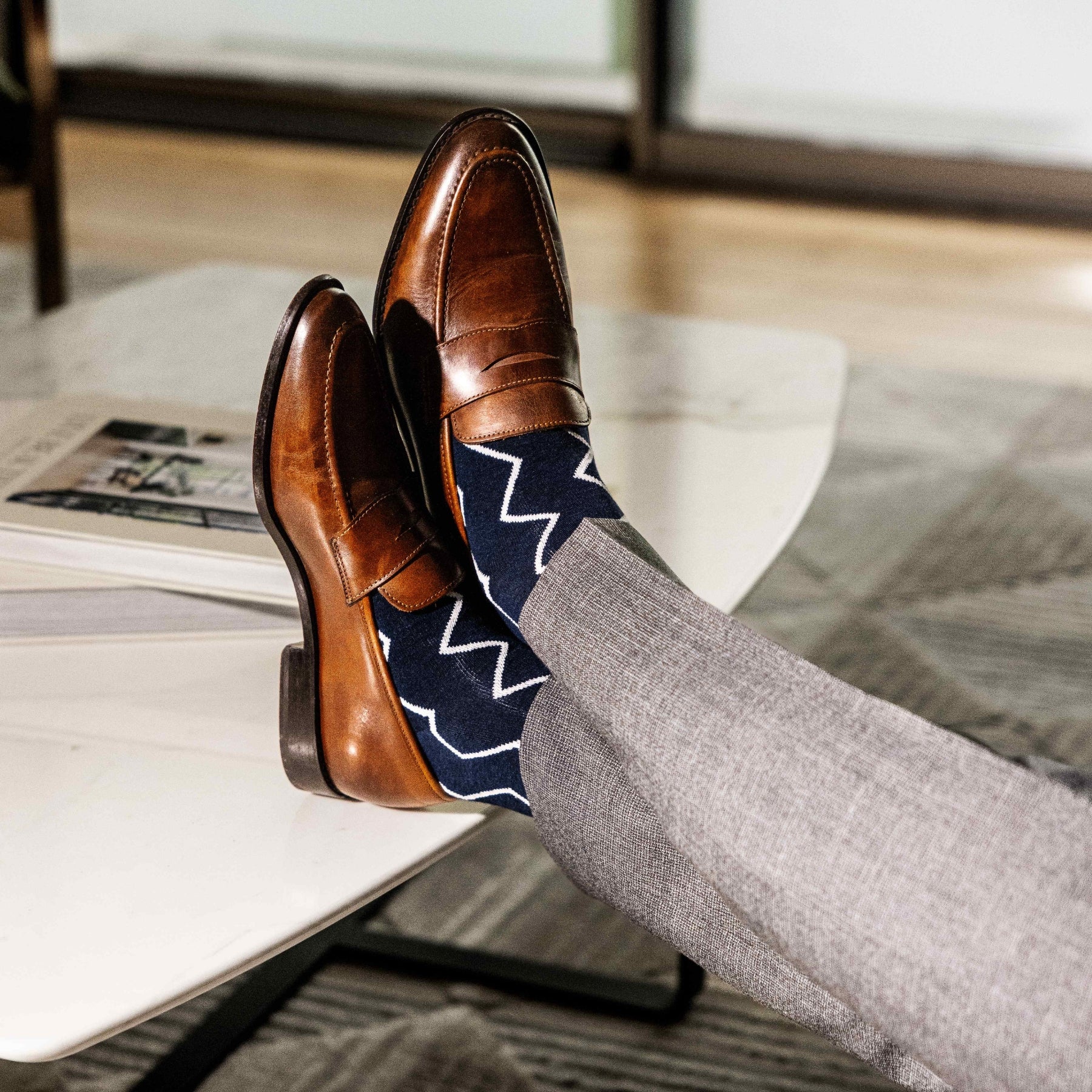 navy blue socks with a white zigzag pattern