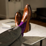 Plum purple men's dress socks with a black zigzag pattern