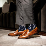 navy blue socks with a white zigzag pattern