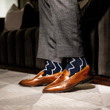 navy blue socks with a white zigzag pattern