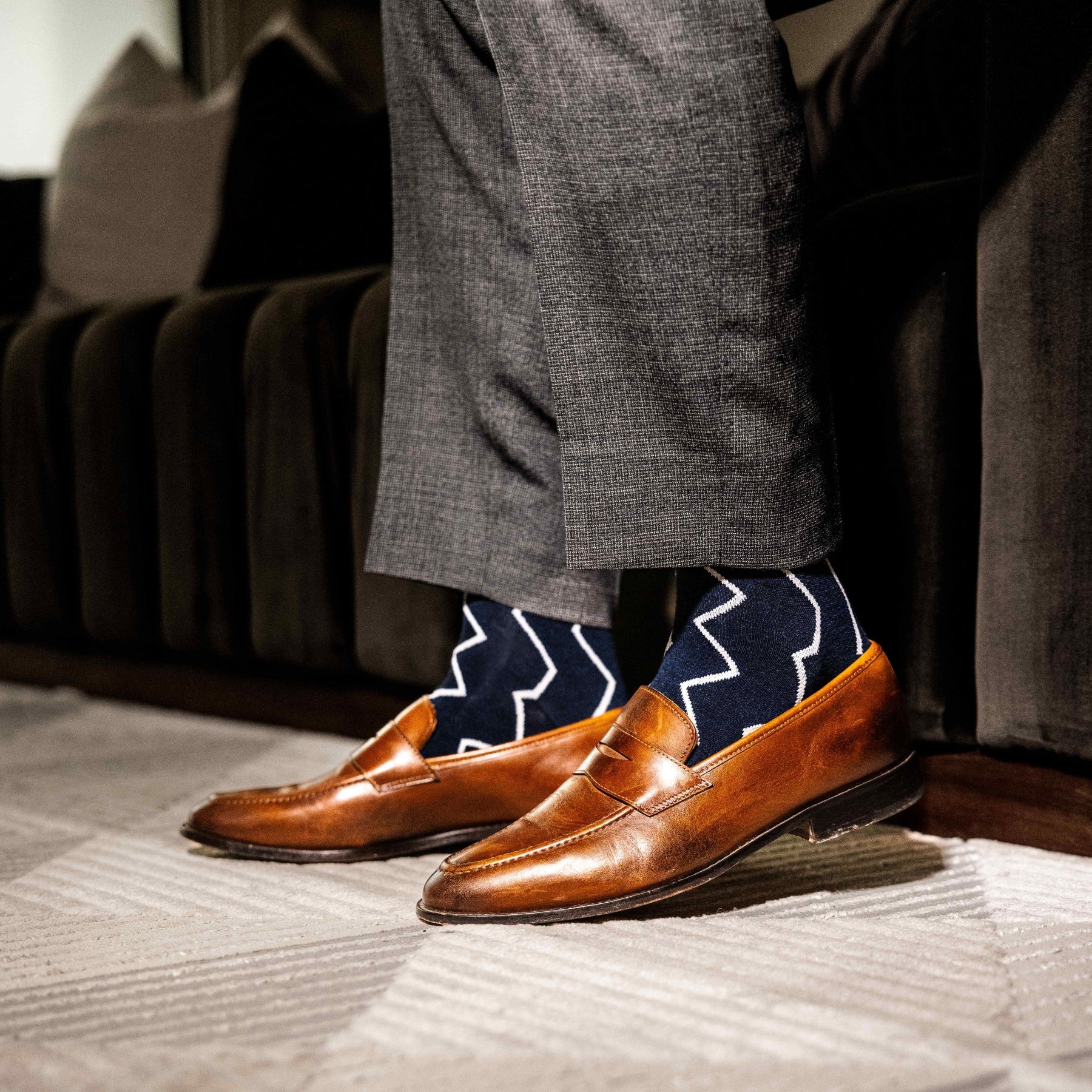 navy blue socks with a white zigzag pattern