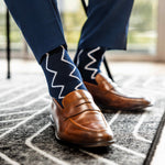 navy blue socks with a white zigzag pattern
