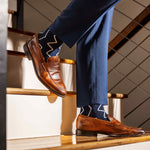 navy blue socks with a white zigzag pattern