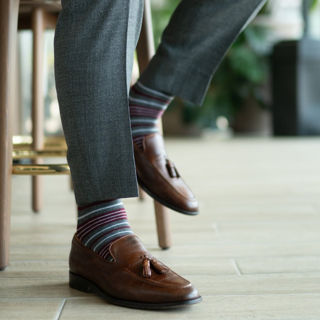 Grey men's dress sock with garnet red and white stripes