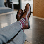 Grey men's dress sock with garnet red and white stripes