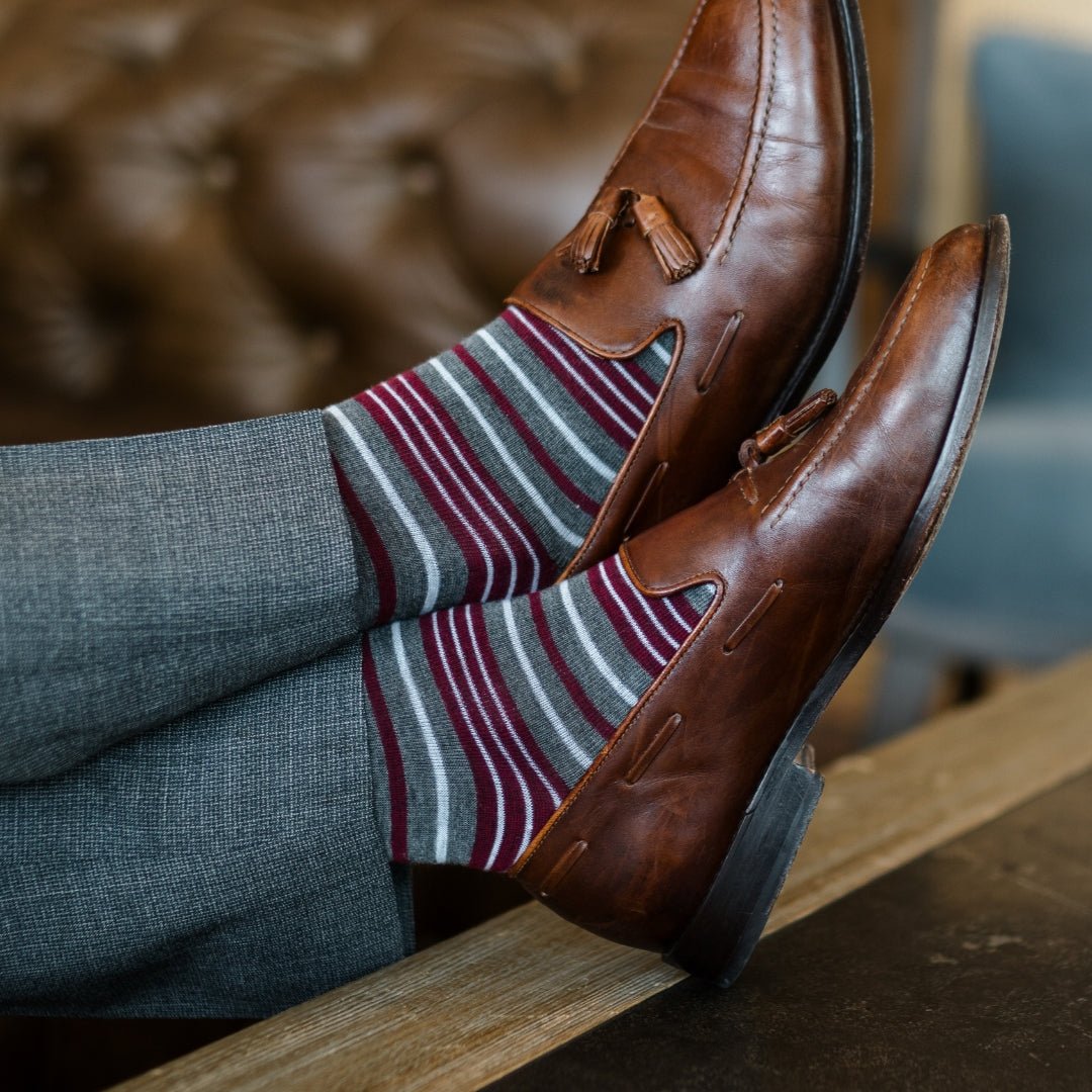 Grey men's dress sock with garnet red and white stripes