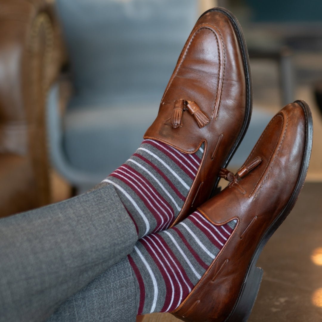 Grey men's dress sock with garnet red and white stripes