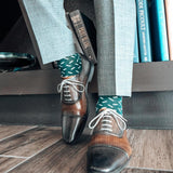Hunter green men's dress sock with a contrasting sprinkle pattern