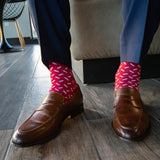 Raspberry red men's dress sock with white sprinkles pattern