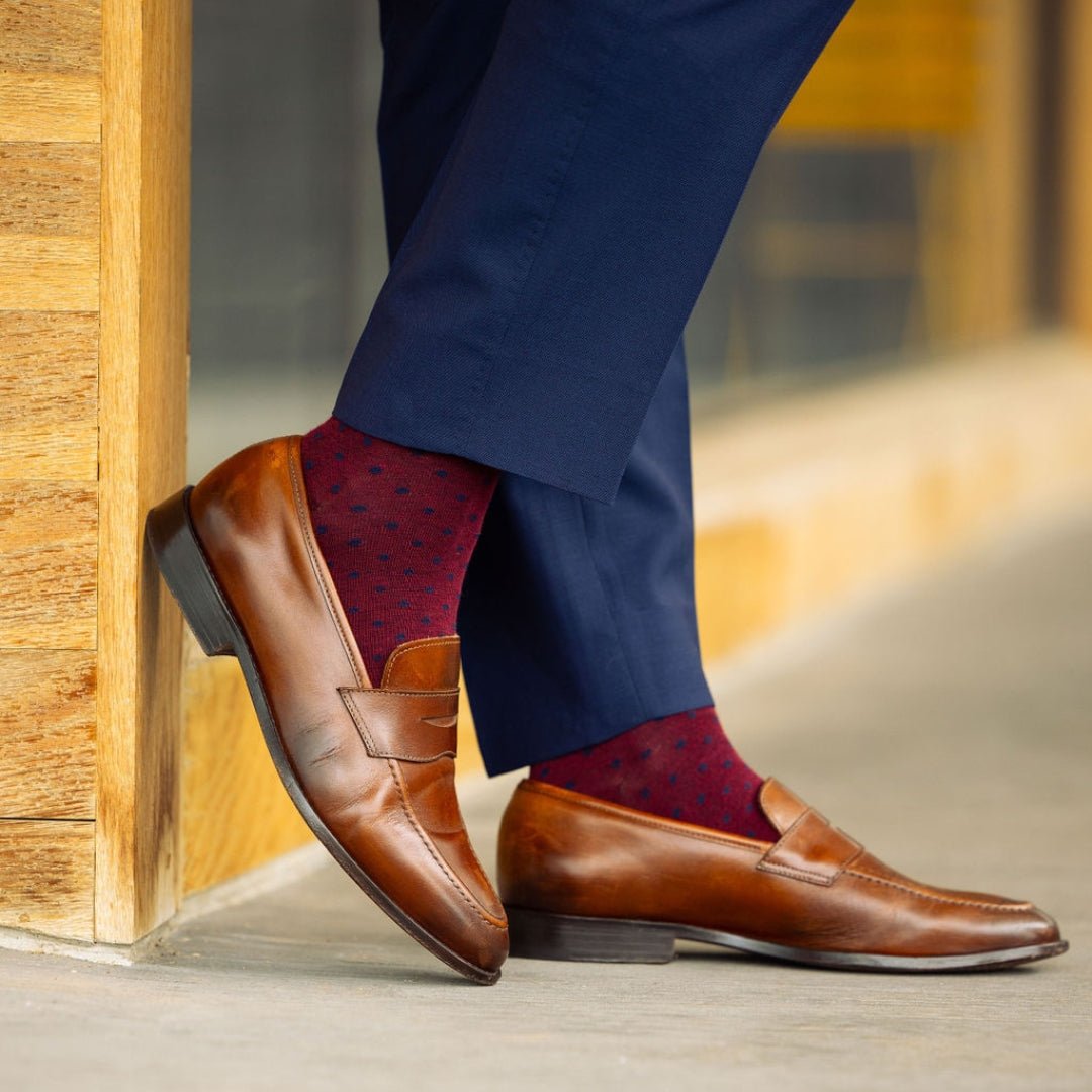 deep red men's dress sock with navy blue polkadots