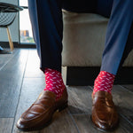 Raspberry red men's dress sock with white sprinkles pattern