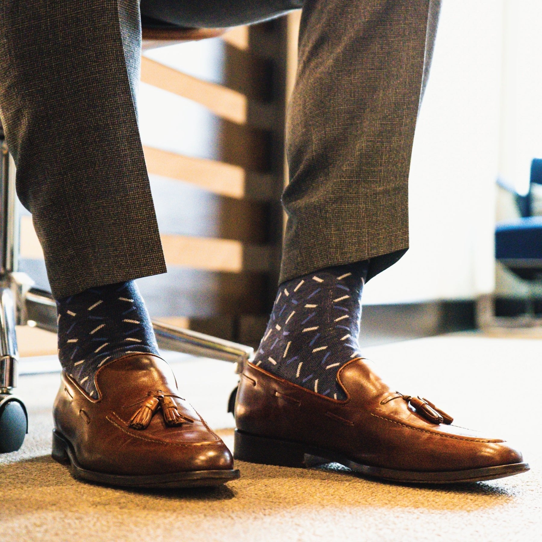 dark blue men's dress socks with light blue and white x pattern