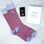 A pair of salmon and blue textured men's socks.