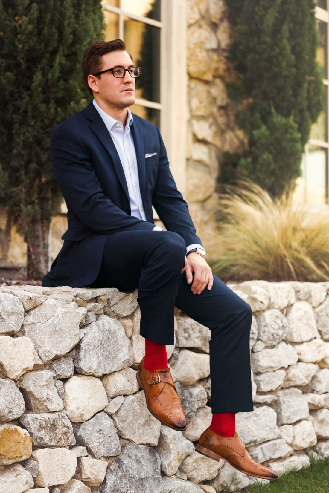 Man in suit shows off awesome socks
