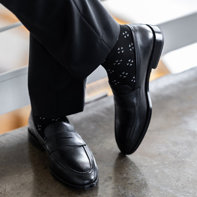 The Black & Grey Flower Petals - A Black Sock with a Grey Flower Petal Pattern