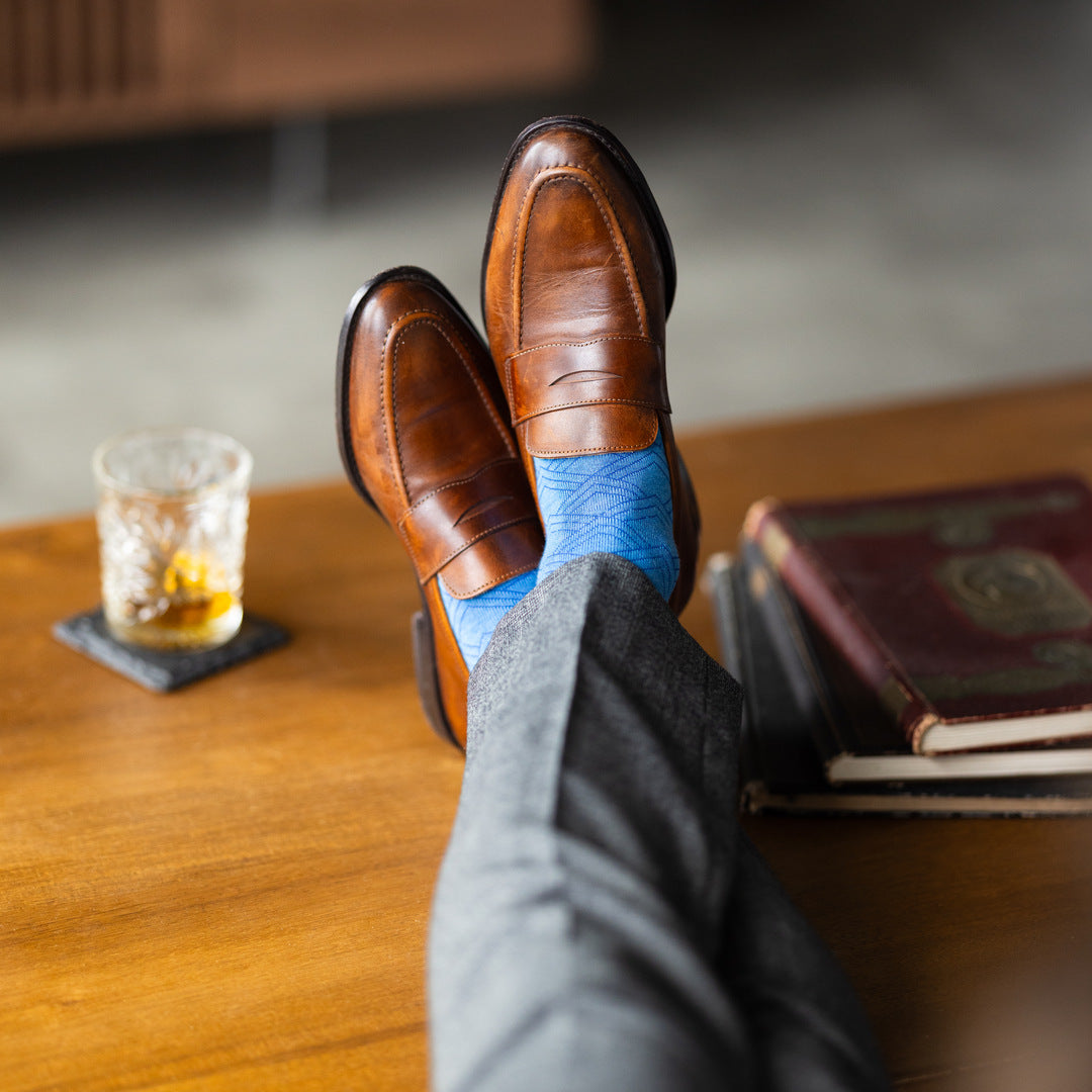 The Azure Blue & Cobalt Square-Grid - An Azure Blue Sock with a Cobalt Blue Square-Grid Pattern men’s dress socks styled with tailored trousers and dress shoes — lifestyle view 4