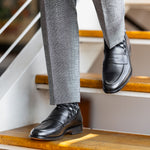 The Sage Green & Taupe Square-Grid - A Sage Green Sock with a Taupe Square-Grid Pattern men’s dress socks styled with tailored trousers and dress shoes — lifestyle view 5