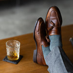 The Sage Green & Taupe Square-Grid - A Sage Green Sock with a Taupe Square-Grid Pattern men’s dress socks styled with tailored trousers and dress shoes — lifestyle view 7