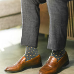 Dark grey Gemstones dress socks with grey trousers and brown leather loafers