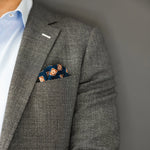 blue and brown floral patterned italian silk pocket square with grey suit and blue shirt