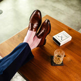 Blush pink men's dress socks with a bubblegum pink vertical stripe pattern