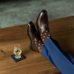 A chocolate brown men's dress sock with cream Fleur De Lis
