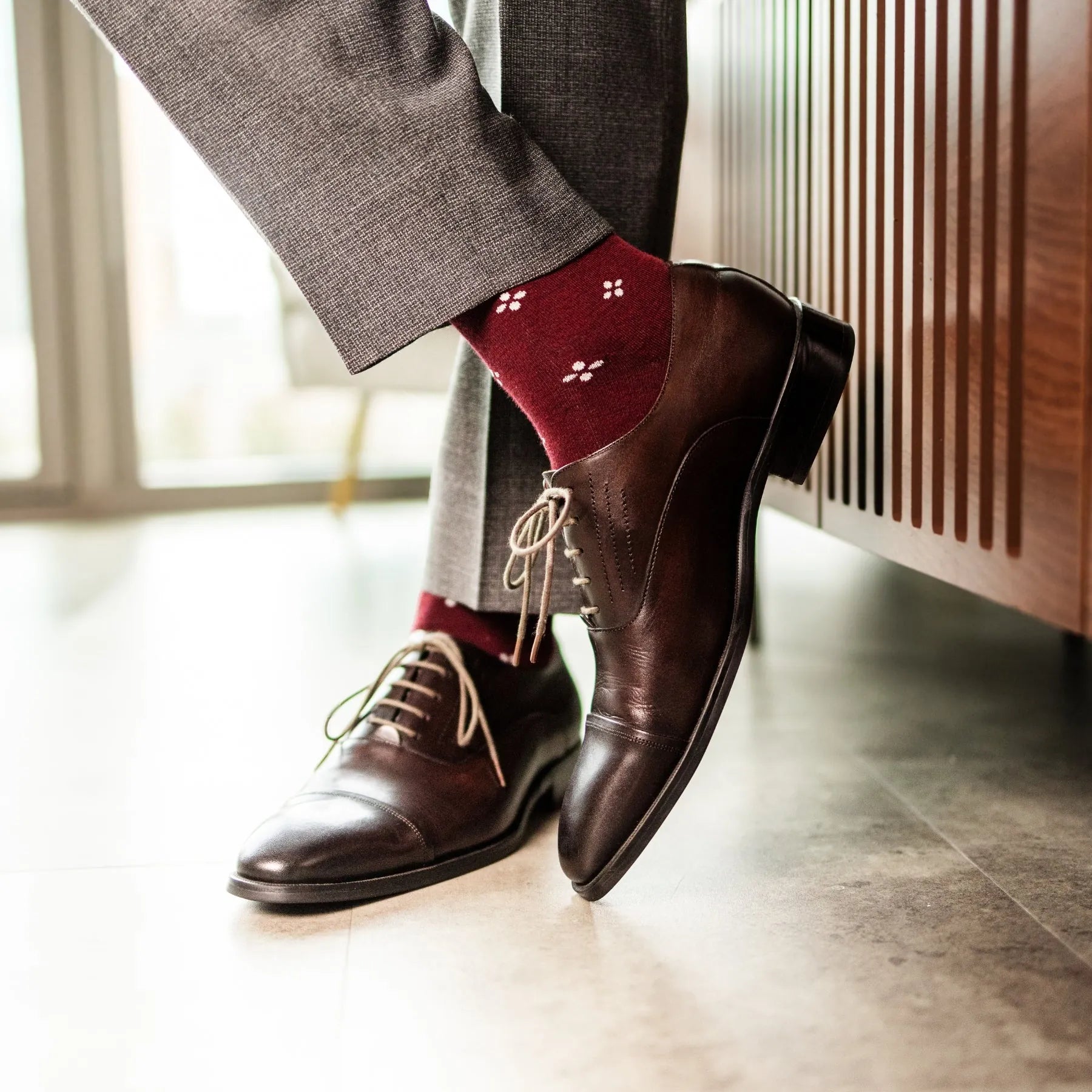 Cranberry Red men's dress sock with a white flower pattern