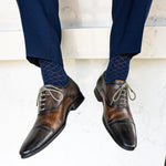 deep blue men's dress sock with contrasting diamond pattern