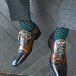 Deep green men's dress sock with contrasting diamond pattern