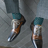 Deep green men's dress sock with contrasting diamond pattern