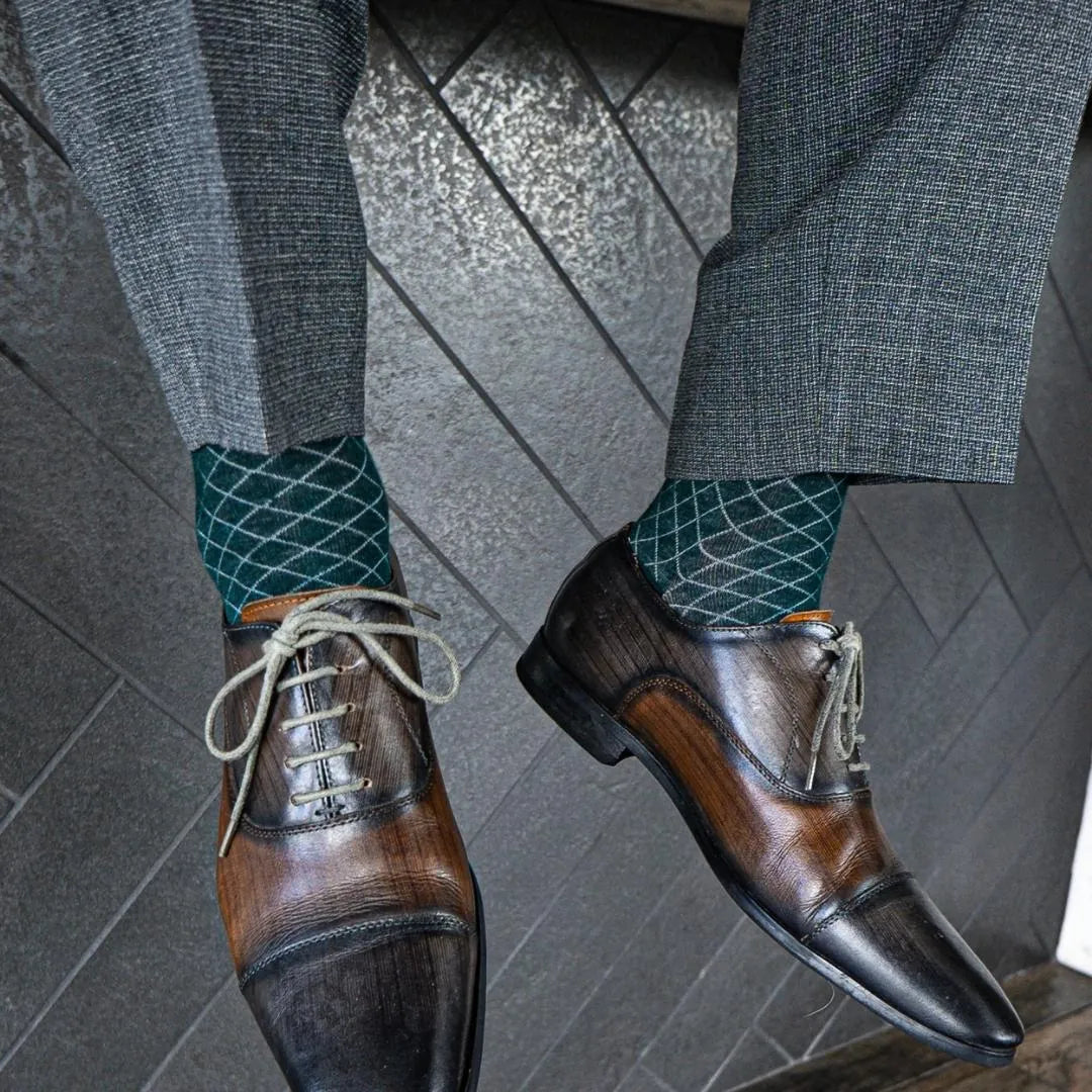 Deep green men's dress sock with contrasting diamond pattern