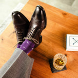 Purple men's dress sock with a white flower pattern