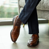 An Espresso Brown Sock with White T-Suns