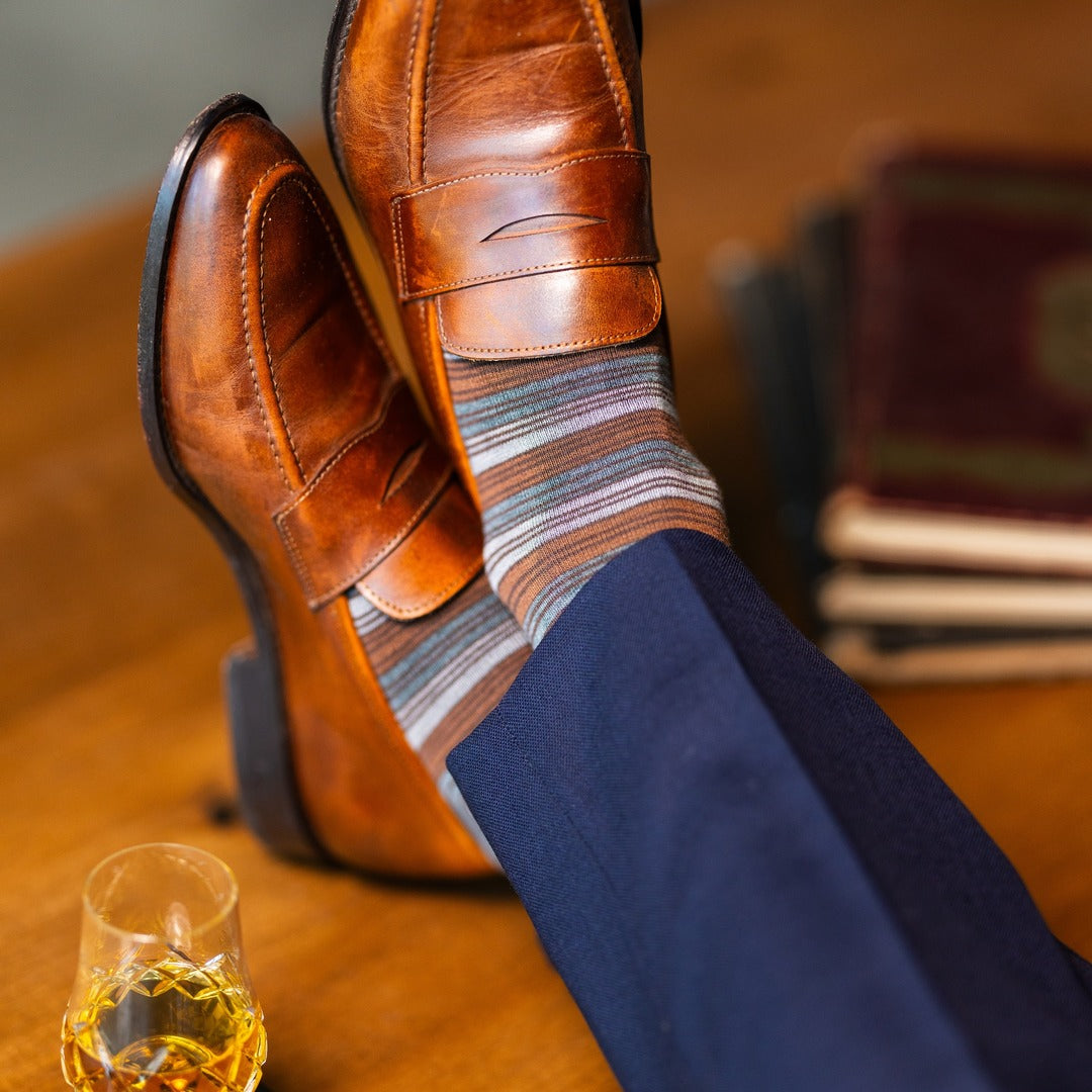 Mocha Multi-Stripe men's dress sock — mocha sock with espresso, teal, and pale blue stripes lifestyle image