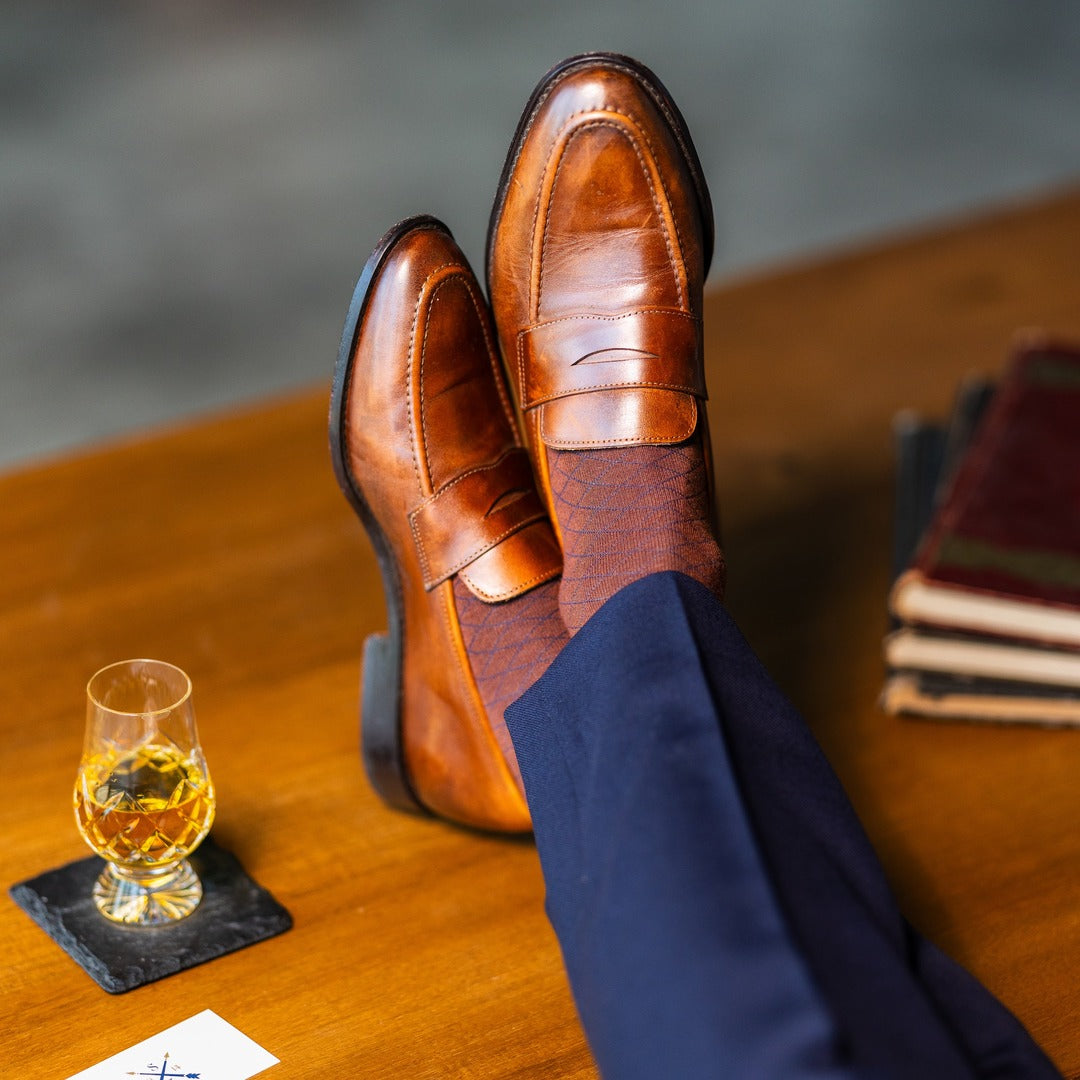 Pecan & Navy Diamonds men's dress sock — pecan brown sock with a navy diamond pattern lifestyle image