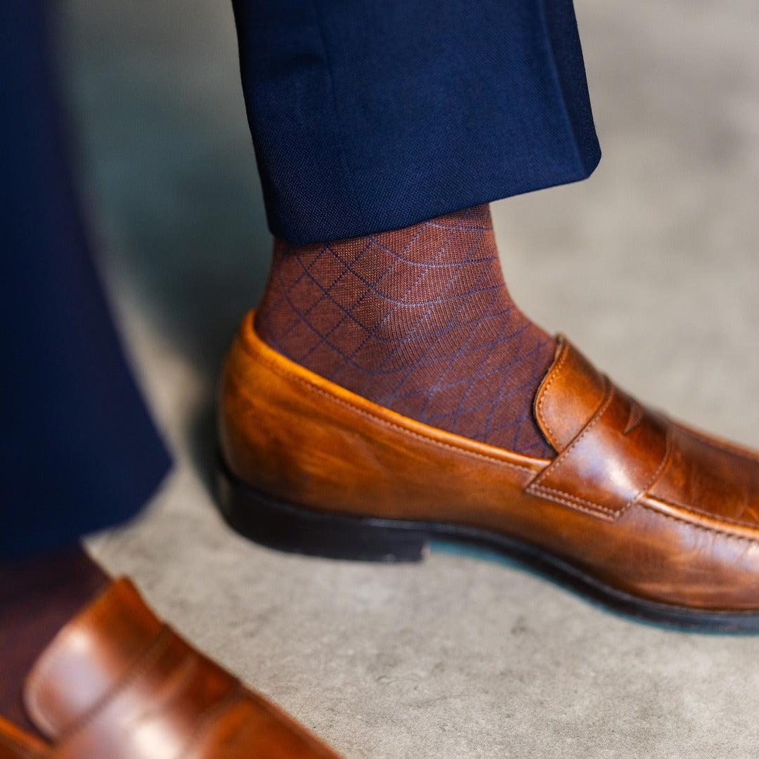 Pecan & Navy Diamonds men's dress sock — pecan brown sock with a navy diamond pattern lifestyle image
