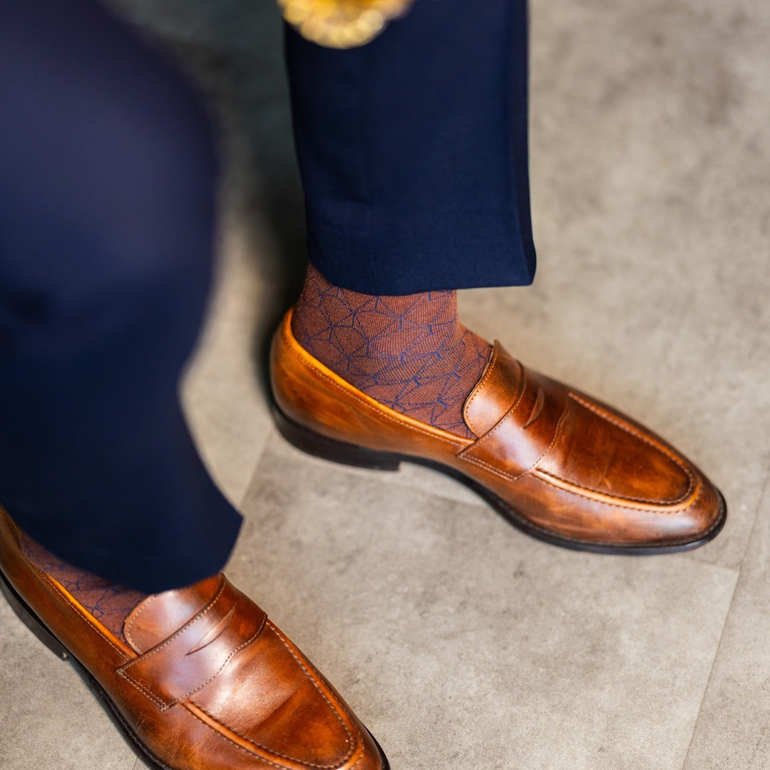 The Pecan & Navy Lattice men's dress sock — pecan brown sock with a navy lattice pattern lifestyle image
