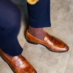 The Pecan & Navy Lattice men's dress sock — pecan brown sock with a navy lattice pattern lifestyle image
