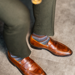 Mocha Multi-Stripe men's dress sock — mocha sock with espresso, teal, and pale blue stripes styled with olive trousers