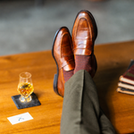 Pecan & Navy Diamonds men's dress sock — pecan brown sock with a navy diamond pattern styled with olive trousers