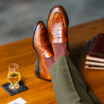 Pecan & Navy Diamonds men's dress sock — pecan brown sock with a navy diamond pattern styled with olive trousers