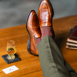 Pecan & Navy Diamonds men's dress sock — pecan brown sock with a navy diamond pattern styled with olive trousers