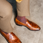 The Pecan & Navy Lattice men's dress sock — pecan brown sock with a navy lattice pattern styled with tan trousers