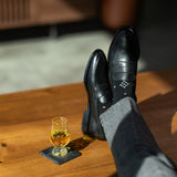 The Black Nested Diamonds men's dress sock — black sock with grey nested diamonds lifestyle image